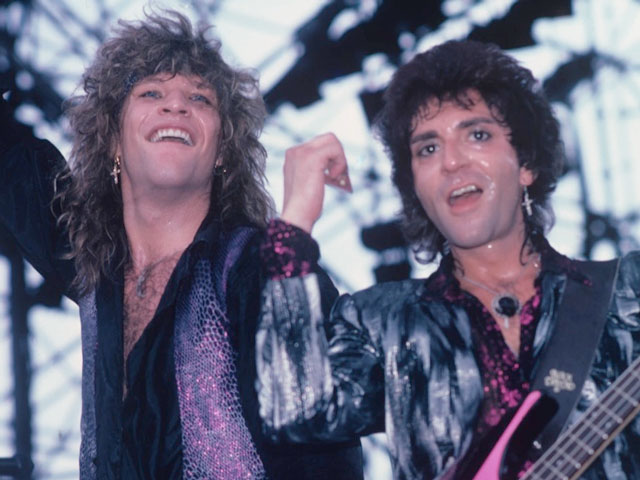 Alec John Such and Jon Bon Jovi playing on stage